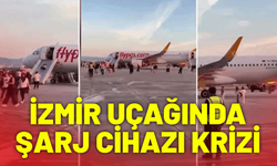 İzmir uçağında şarj cihazı krizi: Yolcular tahliye edildi!