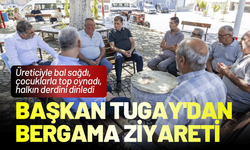 Başkan Tugay'dan Bergama ziyareti: Üreticiyle bal sağdı, çocuklarla top oynadı, halkın derdini dinledi