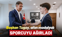 Başkan Tugay, altın madalyalı sporcuyu ağırladı
