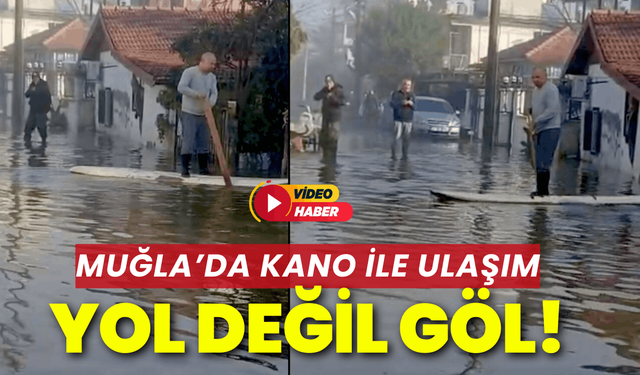 Muğla'da göle dönen yolda kano ile ilerledi
