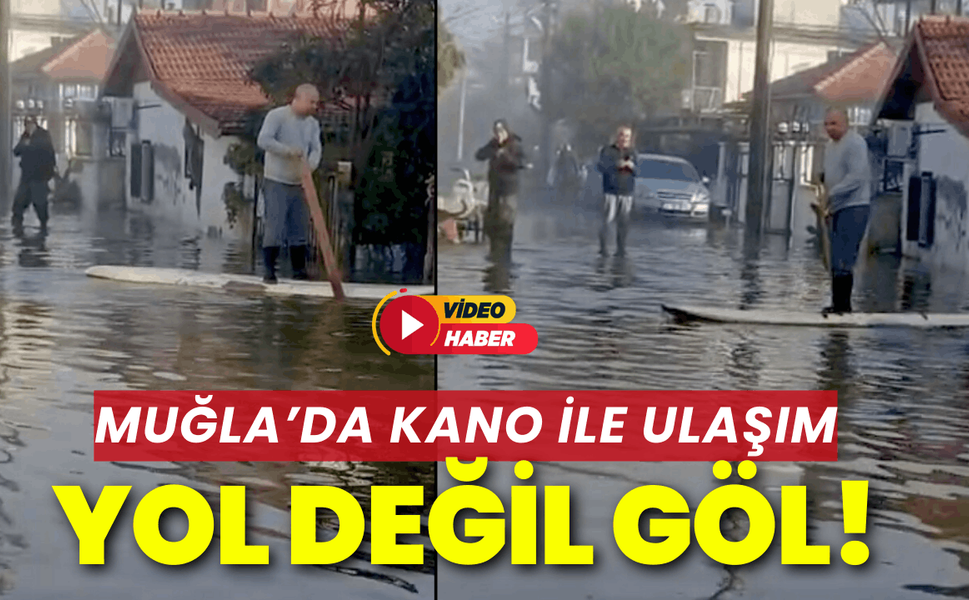 Muğla'da göle dönen yolda kano ile ilerledi